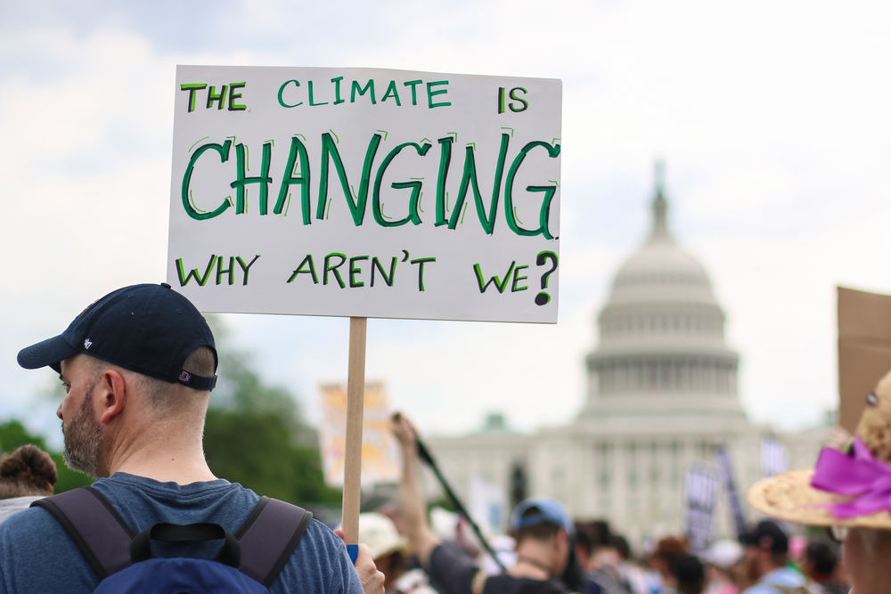 man is protesting for solutions on climate change. The 3R scheme is adopted
