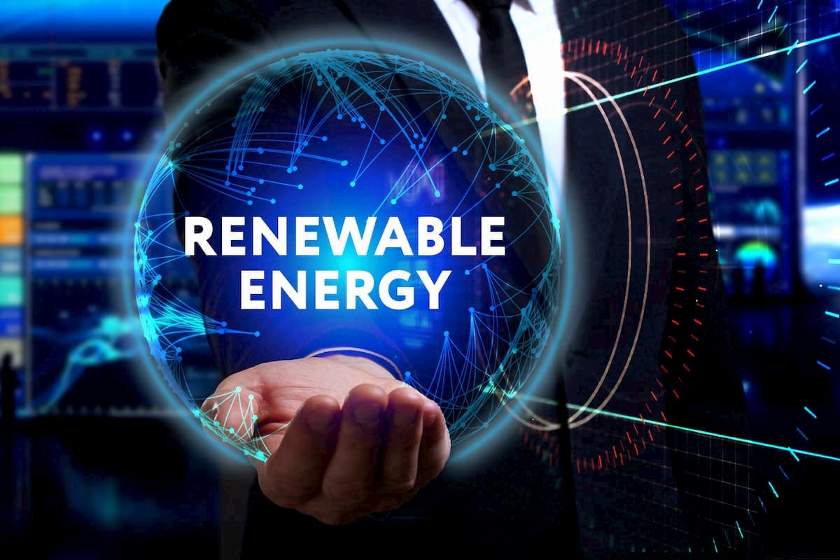 man holding a digital shaped earth entitled renewable energy
